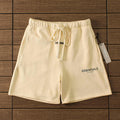 "essence" shorts beige